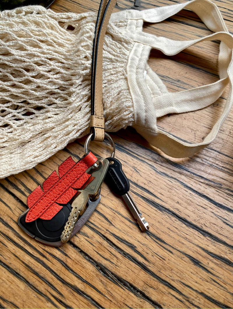 keyring with wrist strap and arrow leather detail