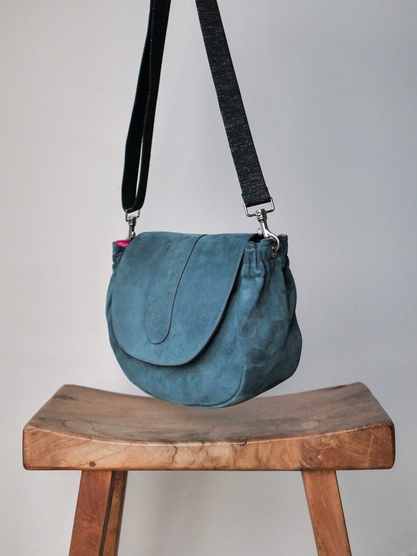 Janis flap bag in petrol suede