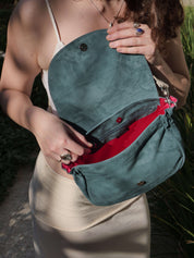 Janis flap bag in petrol suede