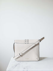crossbody oat colored leather flap bag

