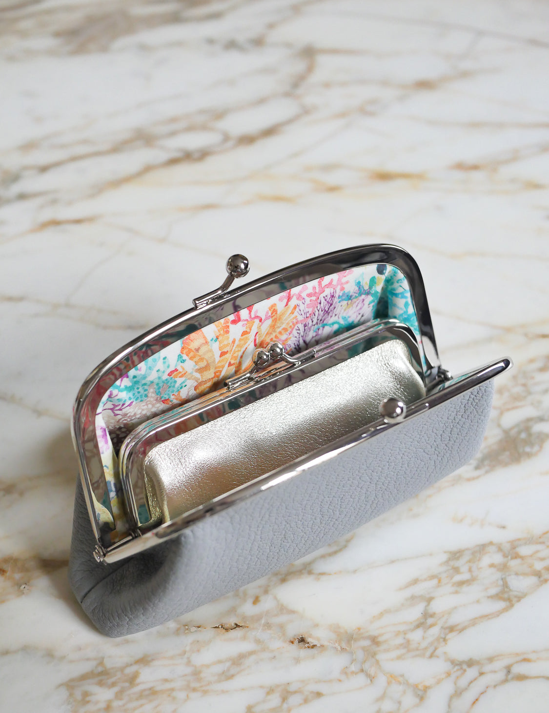 grey leather kisslock purse